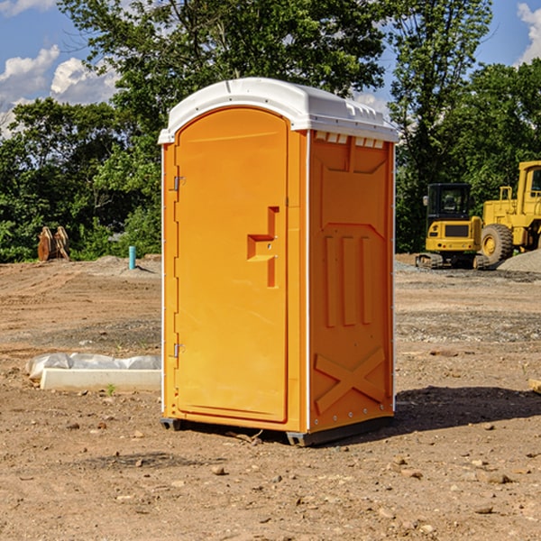 what is the cost difference between standard and deluxe portable toilet rentals in Brimfield